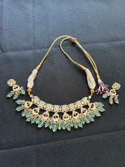 "Graceful Aqua Green Kundan Necklace Ensemble with Delicate Moti Malas"