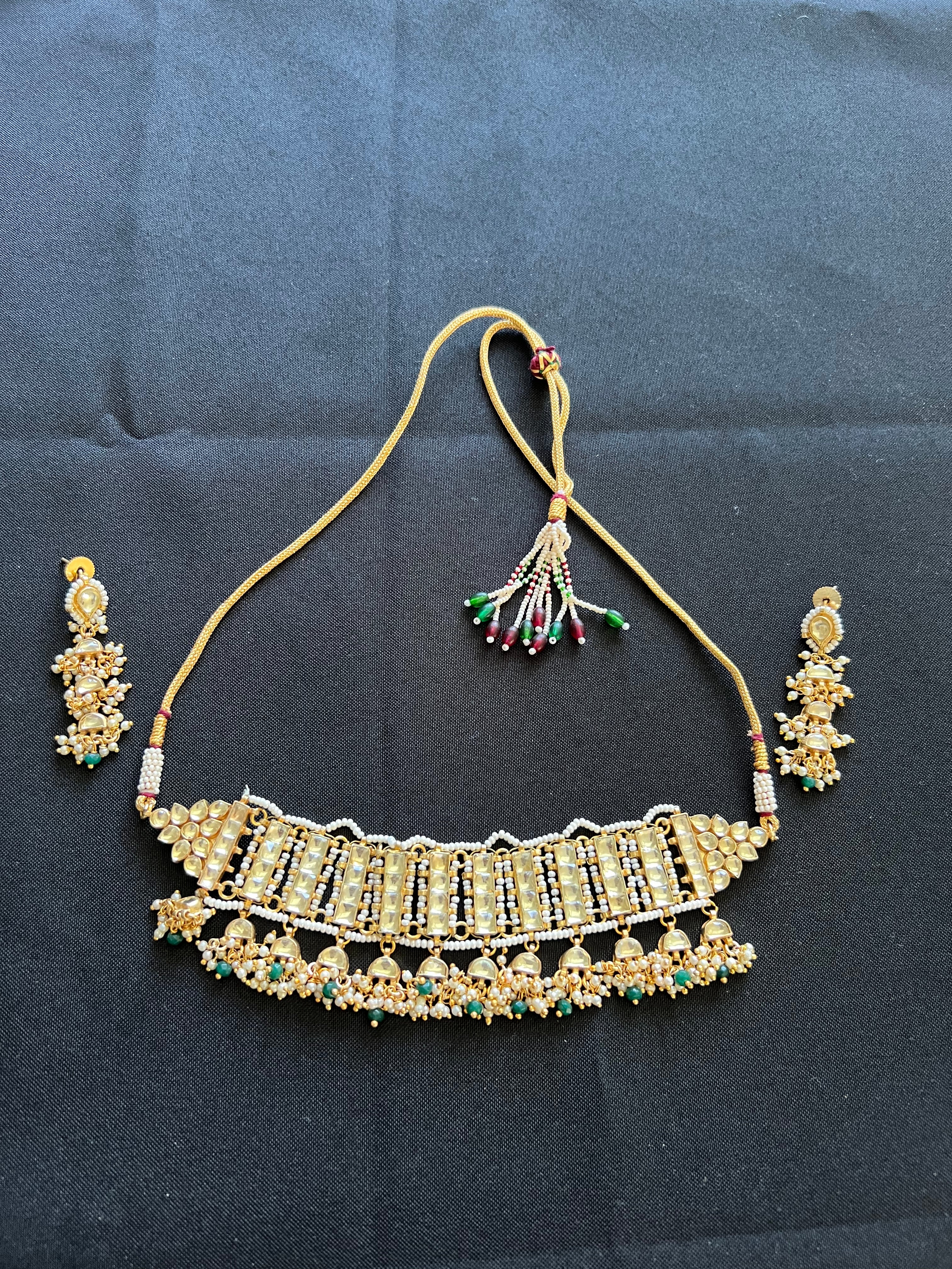 "Radiant Kundan Choker Set: A Timeless Tribute to Elegance"