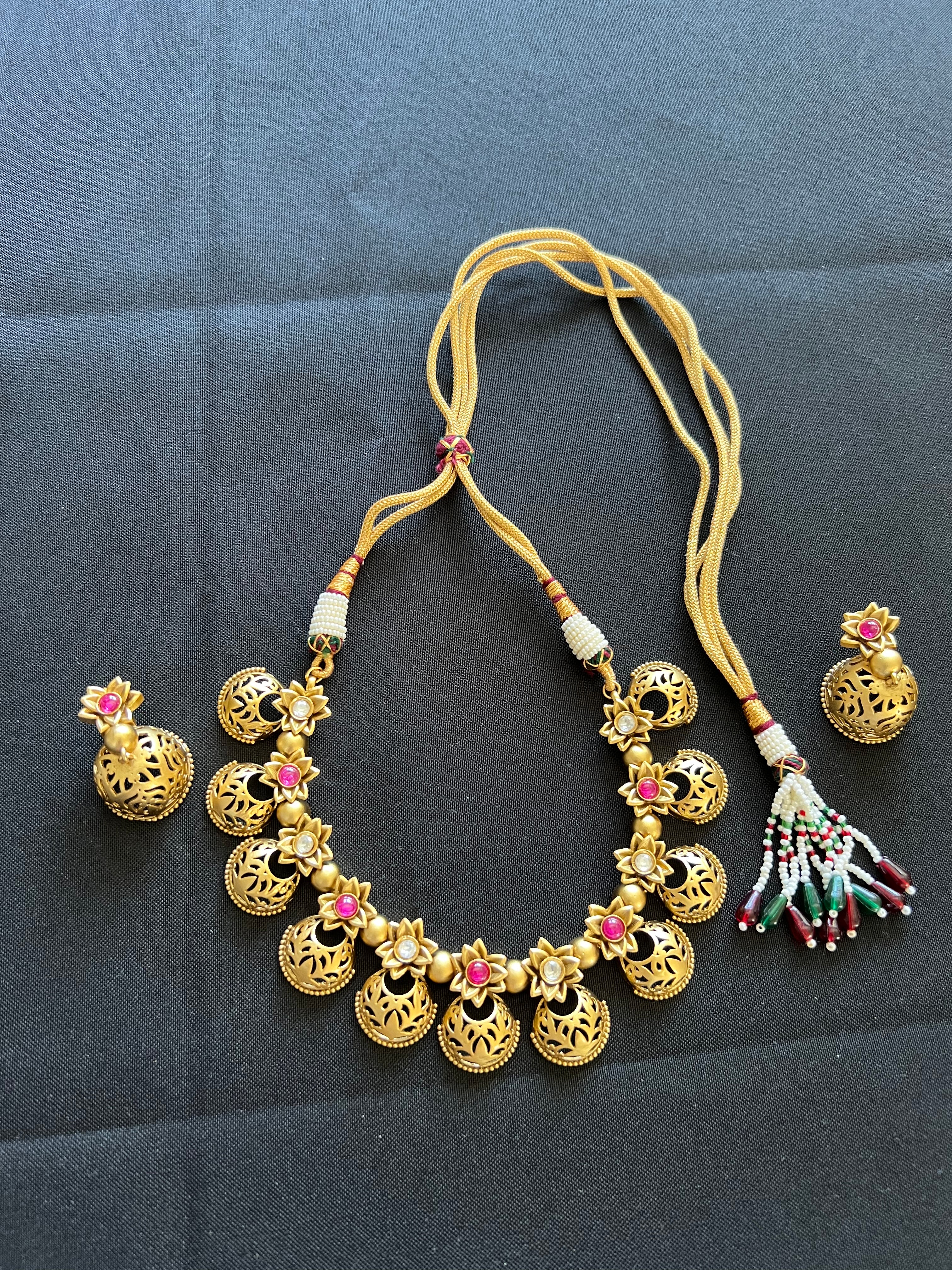 "Enchanting Faux Gold Necklace and Earrings: A Tale of Timeless Beauty"