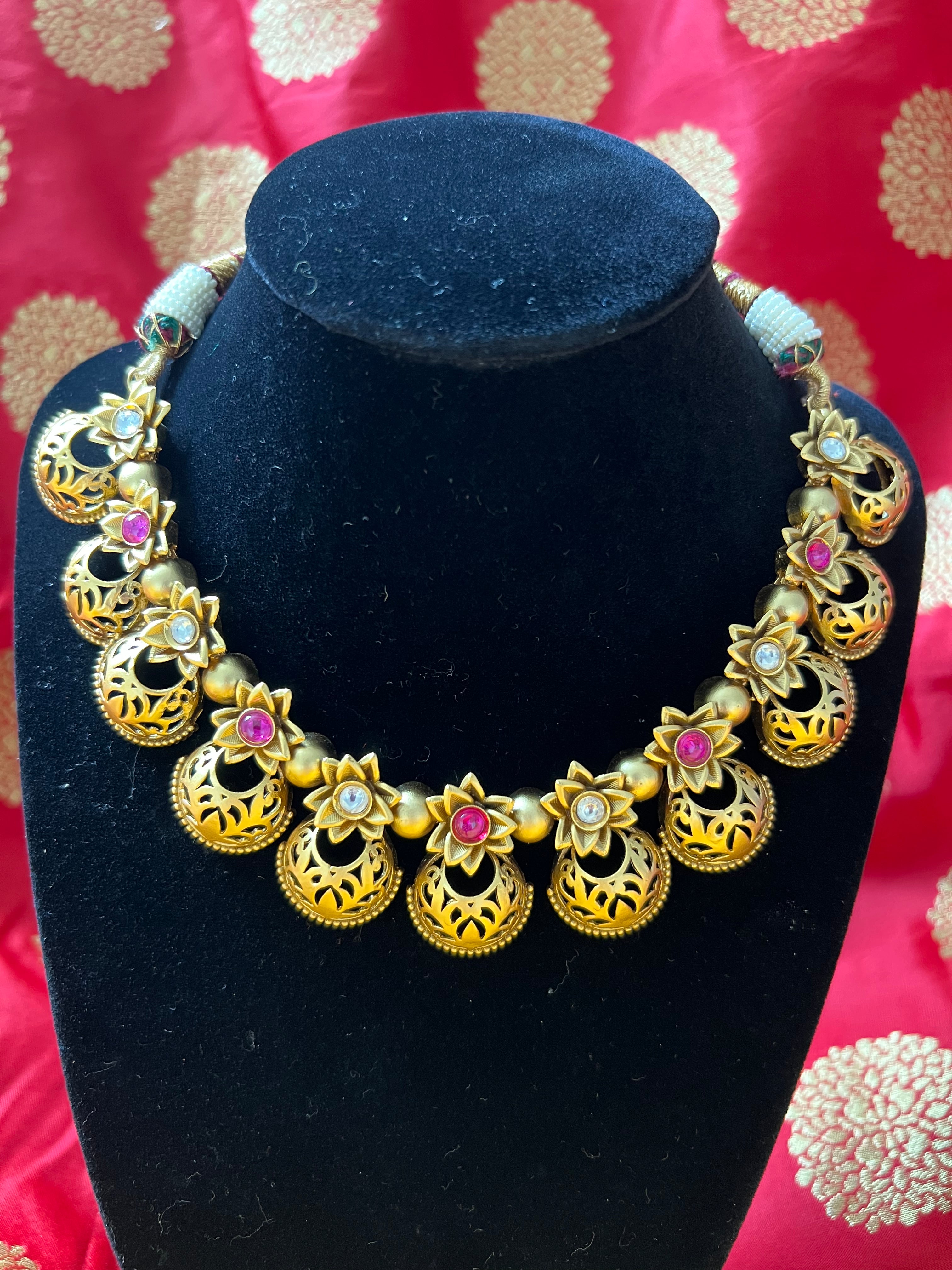 "Enchanting Faux Gold Necklace and Earrings: A Tale of Timeless Beauty"