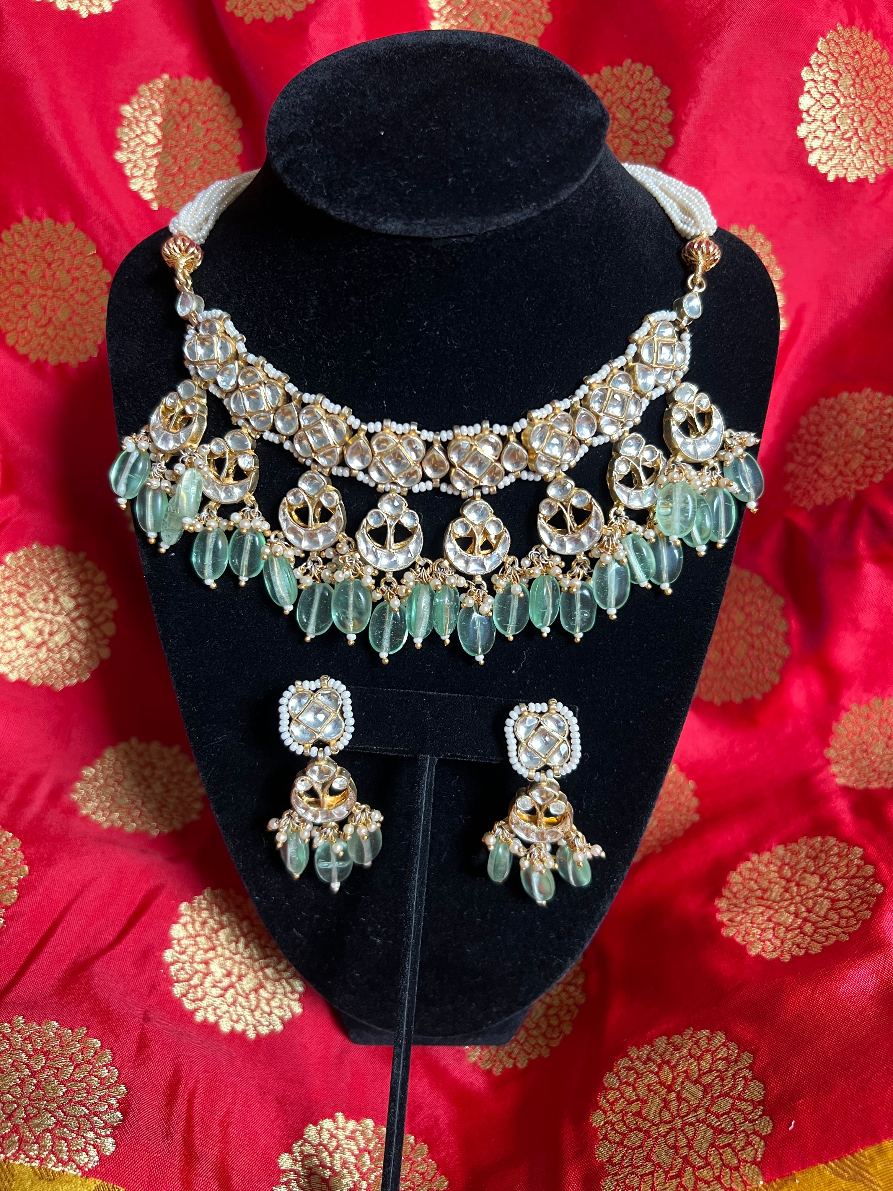 "Graceful Aqua Green Kundan Necklace Ensemble with Delicate Moti Malas"